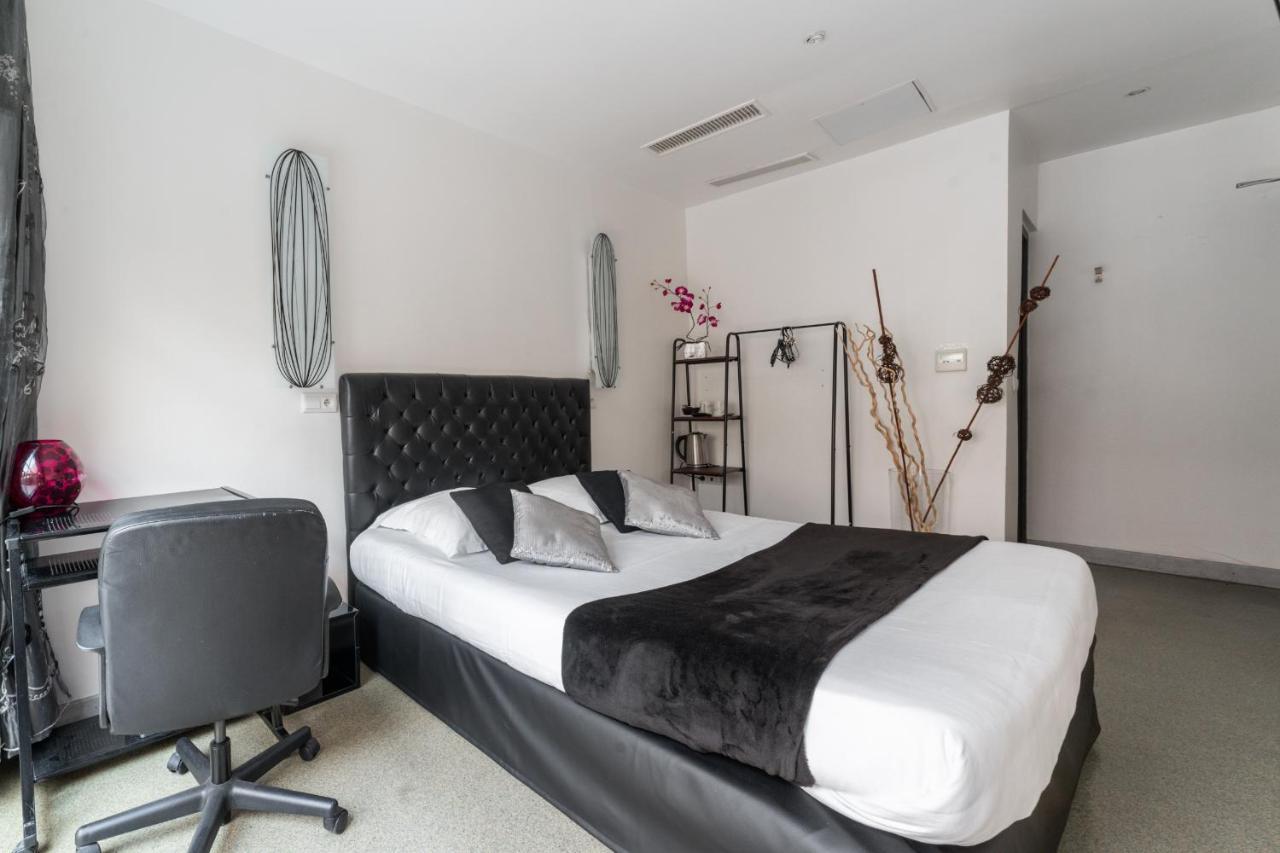 L'Oasis Montparnasse Hotel Paris Bagian luar foto